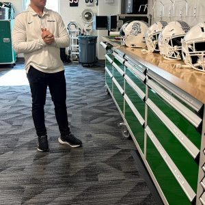 Michigan State engineering prof, student design helmet inserts to help drown out crowd noise for QBs